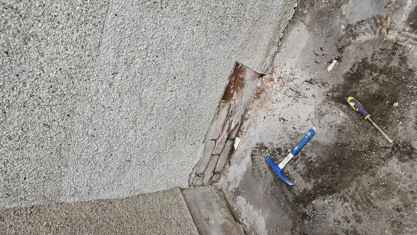 Damaged roughcast removed during the bungalow repairs — Brightons, Falkirk.